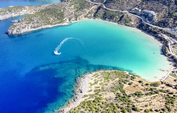A bay with blue waters and a boat
