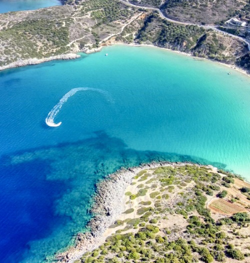 Bay with clear blue waters and a boat